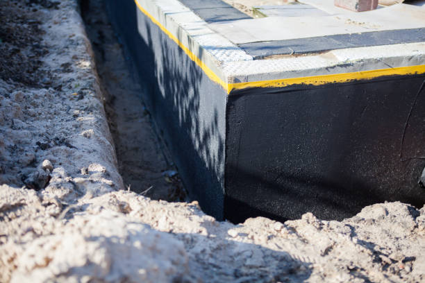 Professional Waterproofing technician working in Clinton, TN